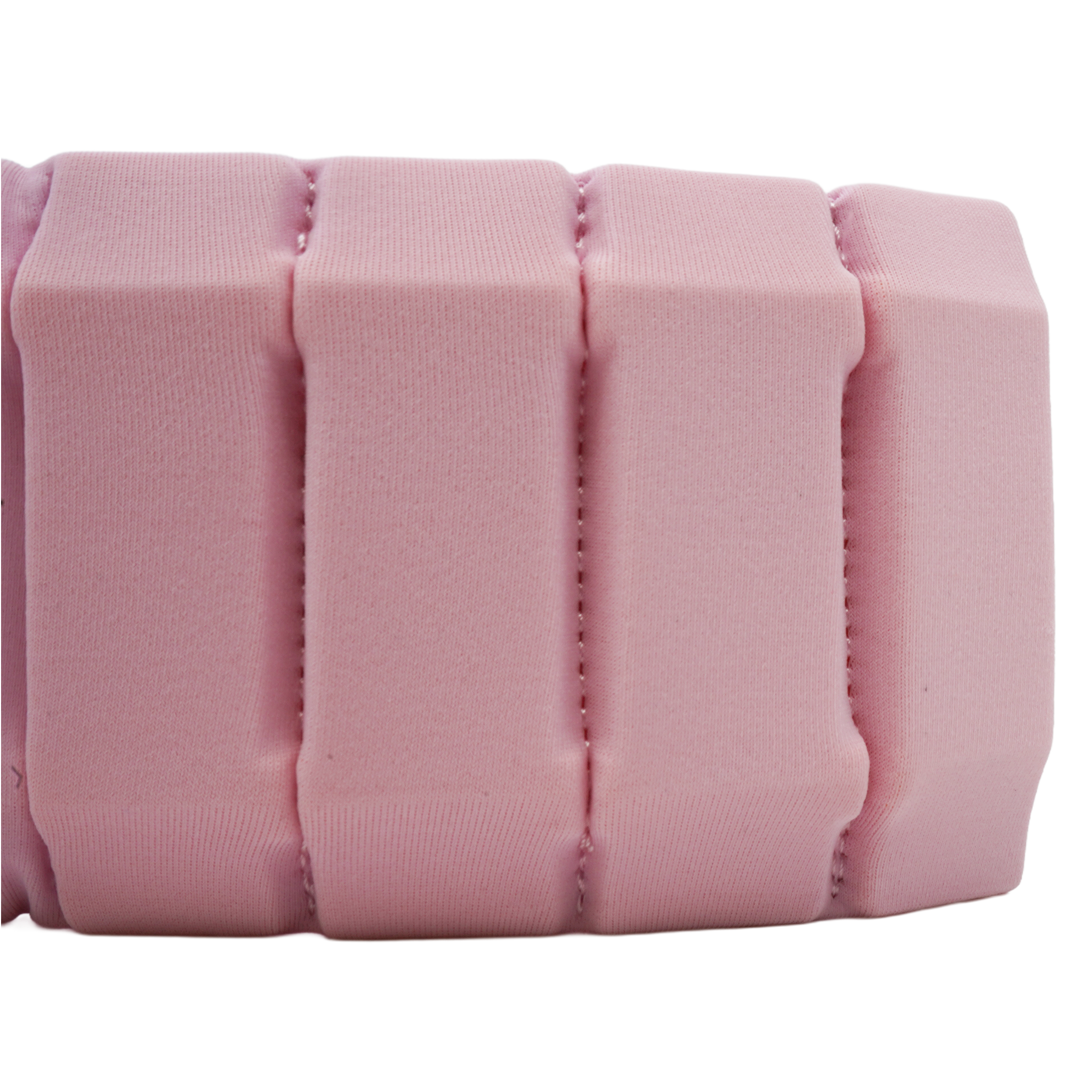 A close-up of a pink textured foam or cushioned strip with vertical ribbed sections, shown against a plain white background.