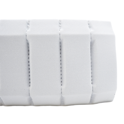 A close-up of a white aura with stitched vertical channels, shown against a plain white background.