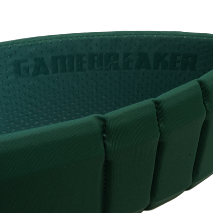 Close-up of a dark green padded headband with the brand name GAMEBREAKER embossed on the inner lining.
