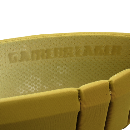 Close-up of a yellow headband with the brand name GAMEBREAKER embossed on the padded interior.