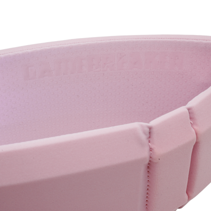 Close-up of a light pink protective sports belt with embossed branding and stitched padding, shown against a white background.
