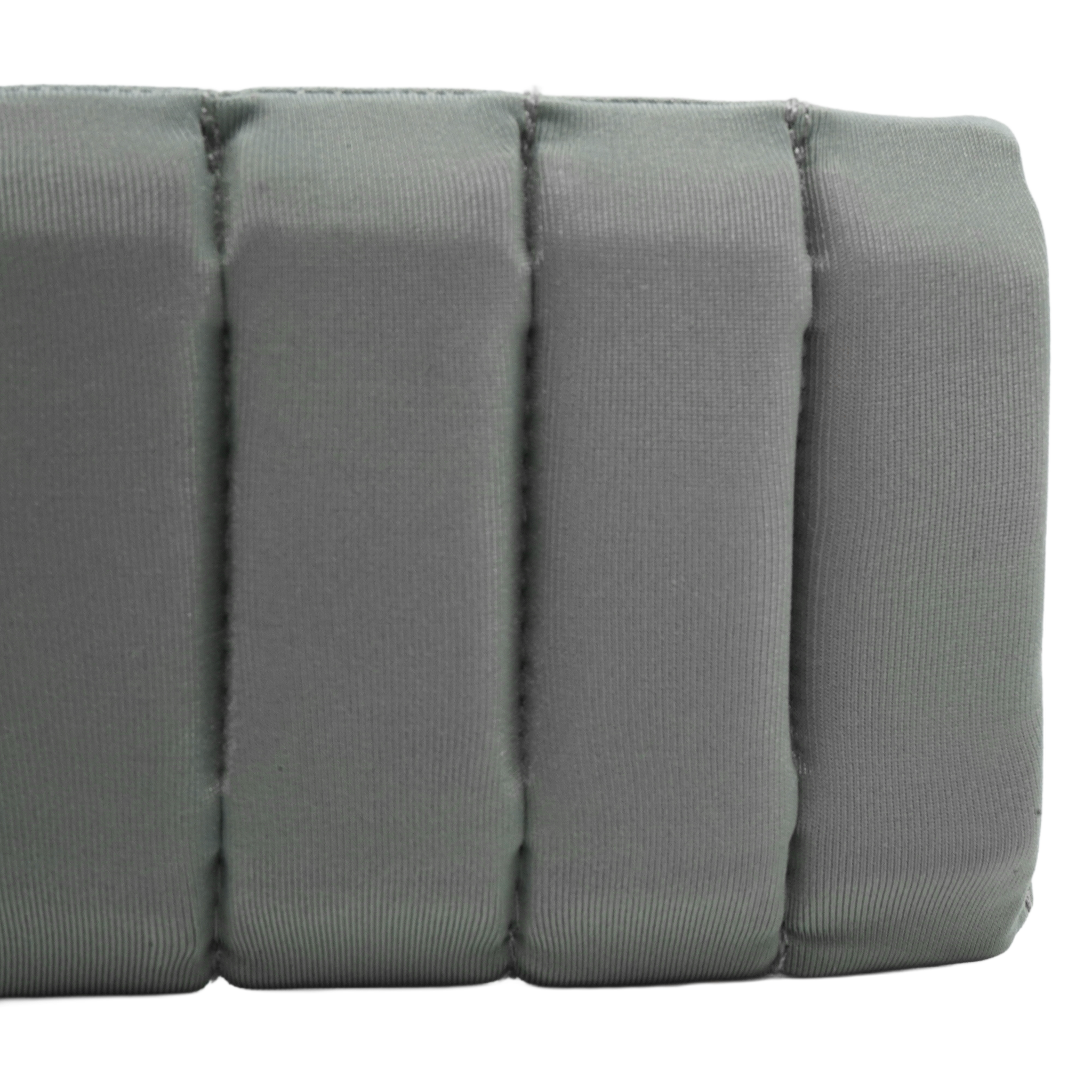 A close-up of a gray padded fabric item with vertical stitched sections, shown against a plain white background.